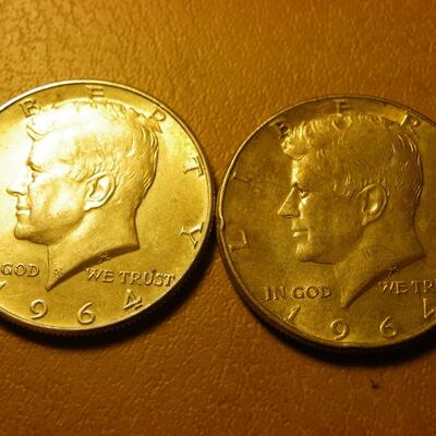2- 1964 Kennedy Silver half dollars.