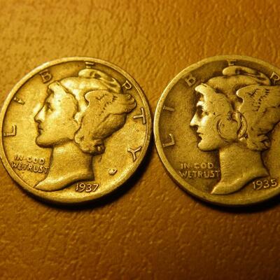 2- 1937 and 1935 Mercury silver dimes.