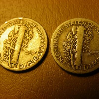 2- 1937 and 1935 Mercury silver dimes.