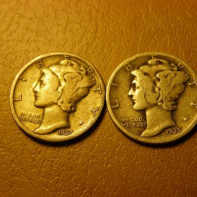 2- 1937 and 1935 Mercury silver dimes.