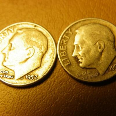 2- 1957 and 1953 Roosevelt silver dimes.
