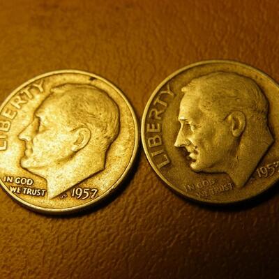 2- 1957 and 1953 Roosevelt silver dimes.