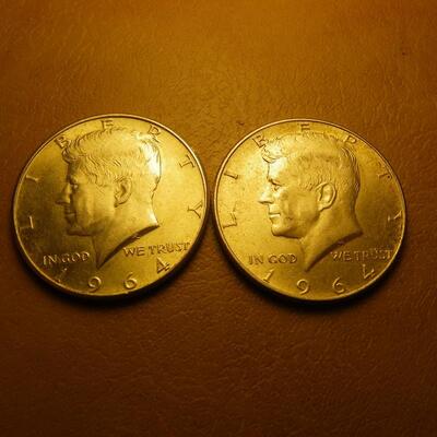 More 1964 Kennedy silver half dollar coins.