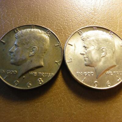 2- 1968 and 1964 Kennedy halve dollar coins.