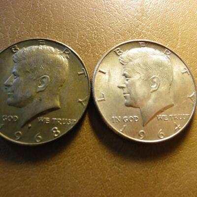 2- 1968 and 1964 Kennedy halve dollar coins.