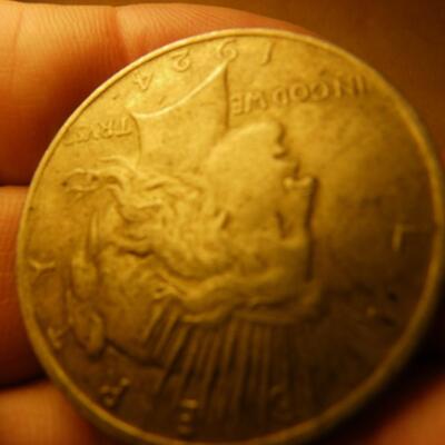 1924 Liberty head silver dollar.