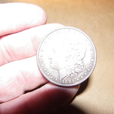 1882 Morgan silver dollar.