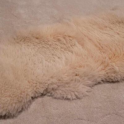 Lot 420: Large Sheep Skin Rug