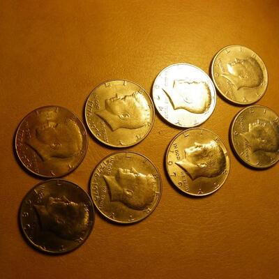 8- Kennedy half dollars with 2 centennial coins.