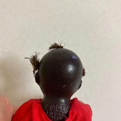 Vintage ceramic black baby doll
