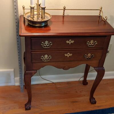 Mahogany side table with brass ledge