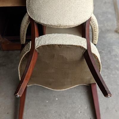 Antique but comfy cream arm chair