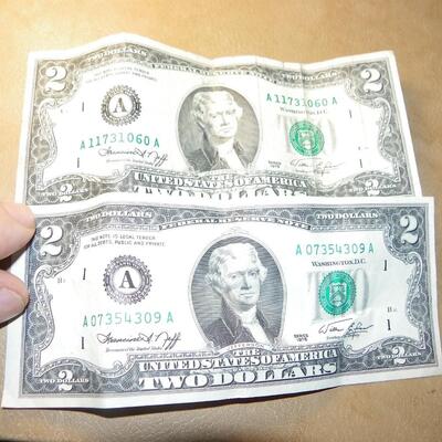 2- Collector 2 dollar bills.