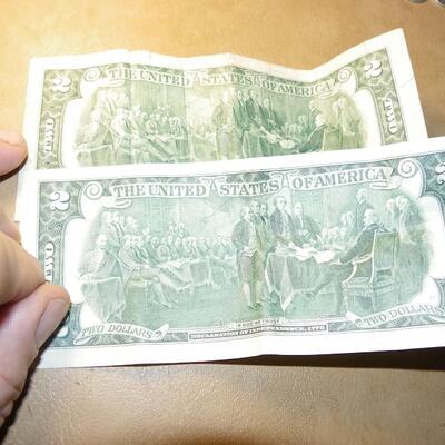 2- Collector 2 dollar bills.