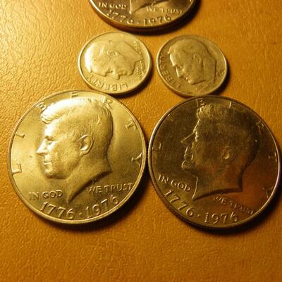 3- Bicentennial Kennedy half 's and 2 Roosevelt silver dimes.
