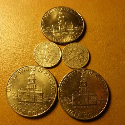 3- Bicentennial Kennedy half 's and 2 Roosevelt silver dimes.