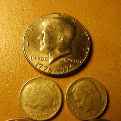 3- Bicentennial Kennedy half 's and 2 Roosevelt silver dimes.