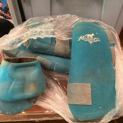 Set of green Professional Choice protective leg and hoof guards