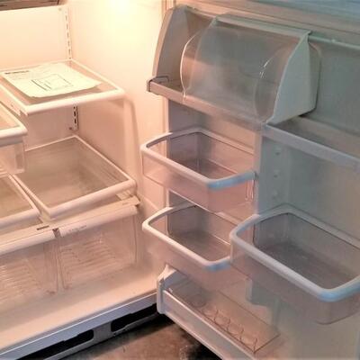 Lot #124  Kenmore Cold Spot Refrigerator with Ice Machine