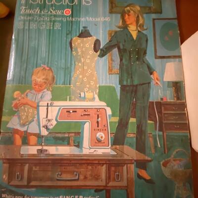 Vintage Singer â€œTouch & Sewâ€ 646 sewing machine in cabinet with chair