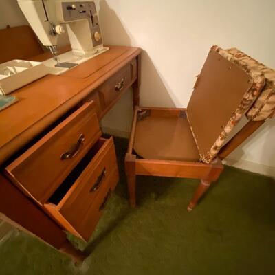 Vintage Singer â€œTouch & Sewâ€ 646 sewing machine in cabinet with chair