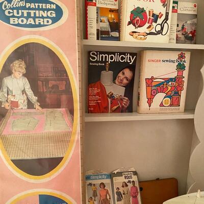 Vintage sewing books & cutting board