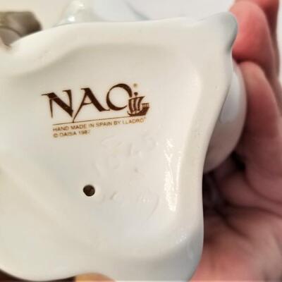 Lot #165  LLADRO Nao figurine - Girl with Birthday Cake