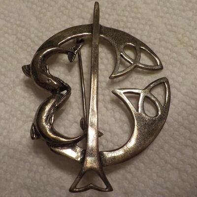 Sterling silver vintage dolphins pin.