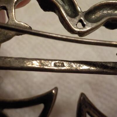 Sterling silver vintage dolphins pin.