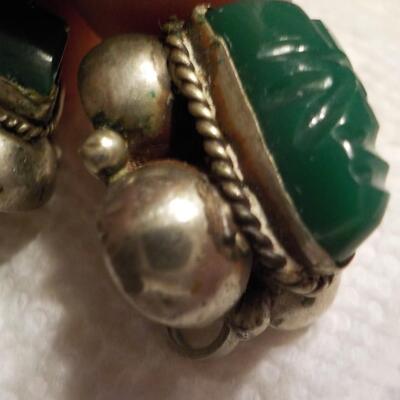 Jade stone earrings with sterling.