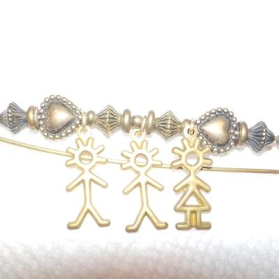 Vintage family brass pin.