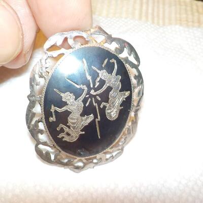 Magic of Dance sterling onyx pin.
