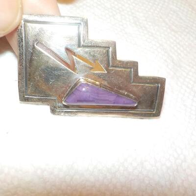 Vintage sterling precious purple stone pin.