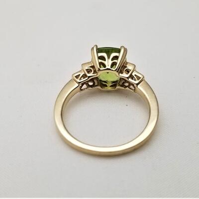 Lot #213  14kt Yellow Gold Peridot Ring with Diamond accents - appraisal included