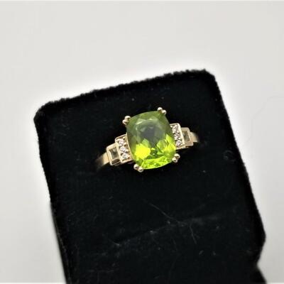 Lot #213  14kt Yellow Gold Peridot Ring with Diamond accents - appraisal included
