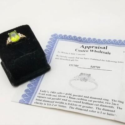 Lot #213  14kt Yellow Gold Peridot Ring with Diamond accents - appraisal included
