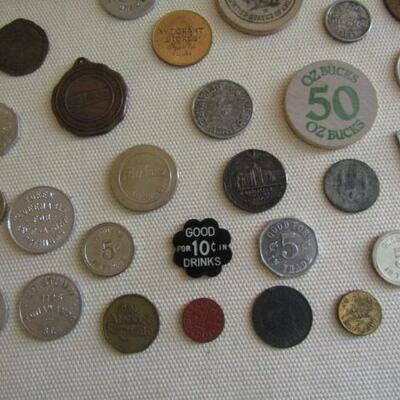 Assortment of Vintage Drink and Advertising Tokens