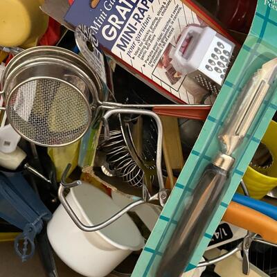Lot 24- Misc. kitchen items, lots of brand new pans