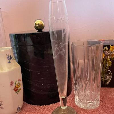 lot 28- sterling silver base crystal vase,(4) crystal vases, (2) style setter vases, (4) glass vases, (2) baskets, limoges vase, ice...