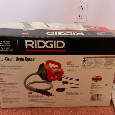 Lot 30- Rigid auto clean drain opener brand new with manual