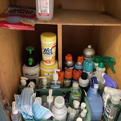 lot 44- Misc. cleaners, hand sanitizer, foil/ plastic wrap, cleaning supplies, vintage metal paper rack
