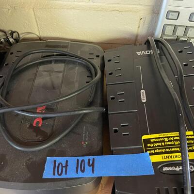 lot 104- (2) power cords with multiple plugs