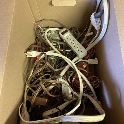 lot 113- (2) boxes of misc. cords, stool