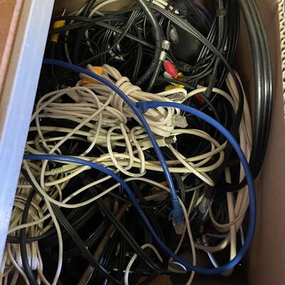 lot 113- (2) boxes of misc. cords, stool