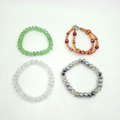 CRYSTAL CUT PLASTIC BEADED BRACELET BUNDLE OF 4