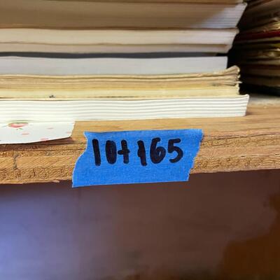 lot 165- Heath kit regulation power supply, sliders, misc. books, misc. machines