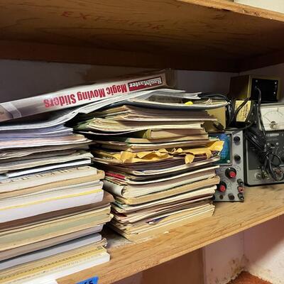 lot 165- Heath kit regulation power supply, sliders, misc. books, misc. machines