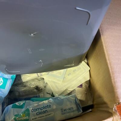 lot 169- Misc. box of cleaning supplies, hygiene products, health products, office supplies