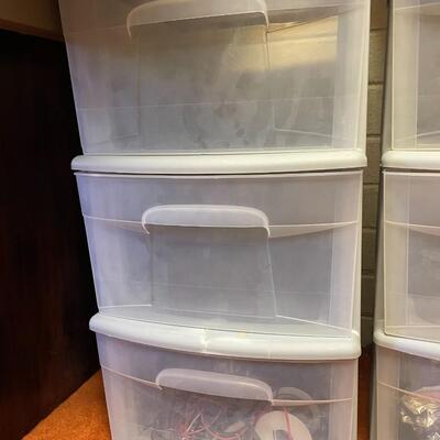 lot 177- (2) small rolling cabinets with contents 