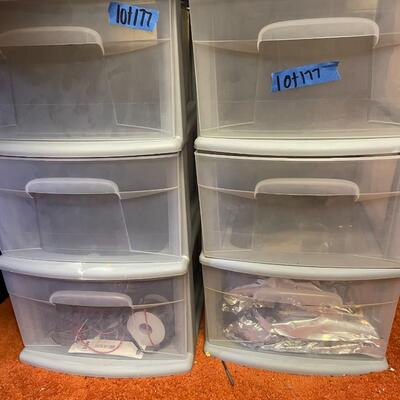 lot 177- (2) small rolling cabinets with contents 